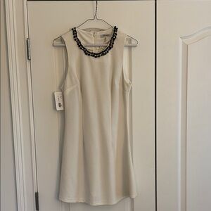 Xtaren Cream and Black Embellished Sheath Mini Dress